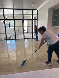 Team member mopping large commercial space